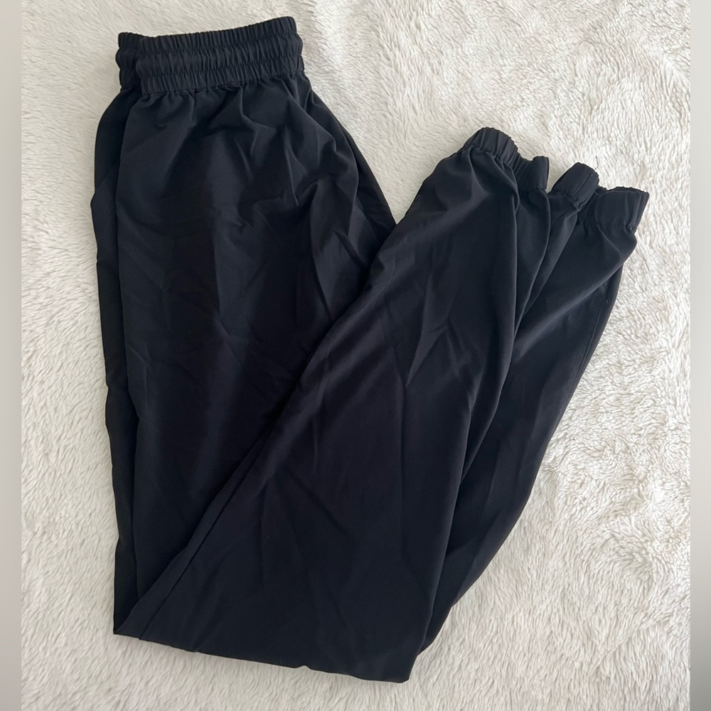 TNA joggers size XS in black